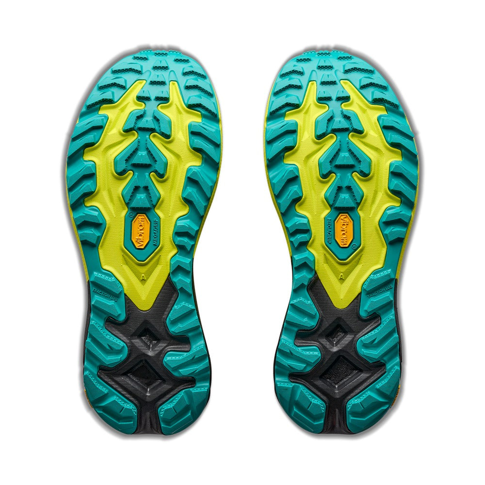 Suela de tacos Vibram Megagrip de la Hoka One One Mafate 5 amarillo y negro, vista inferior del par