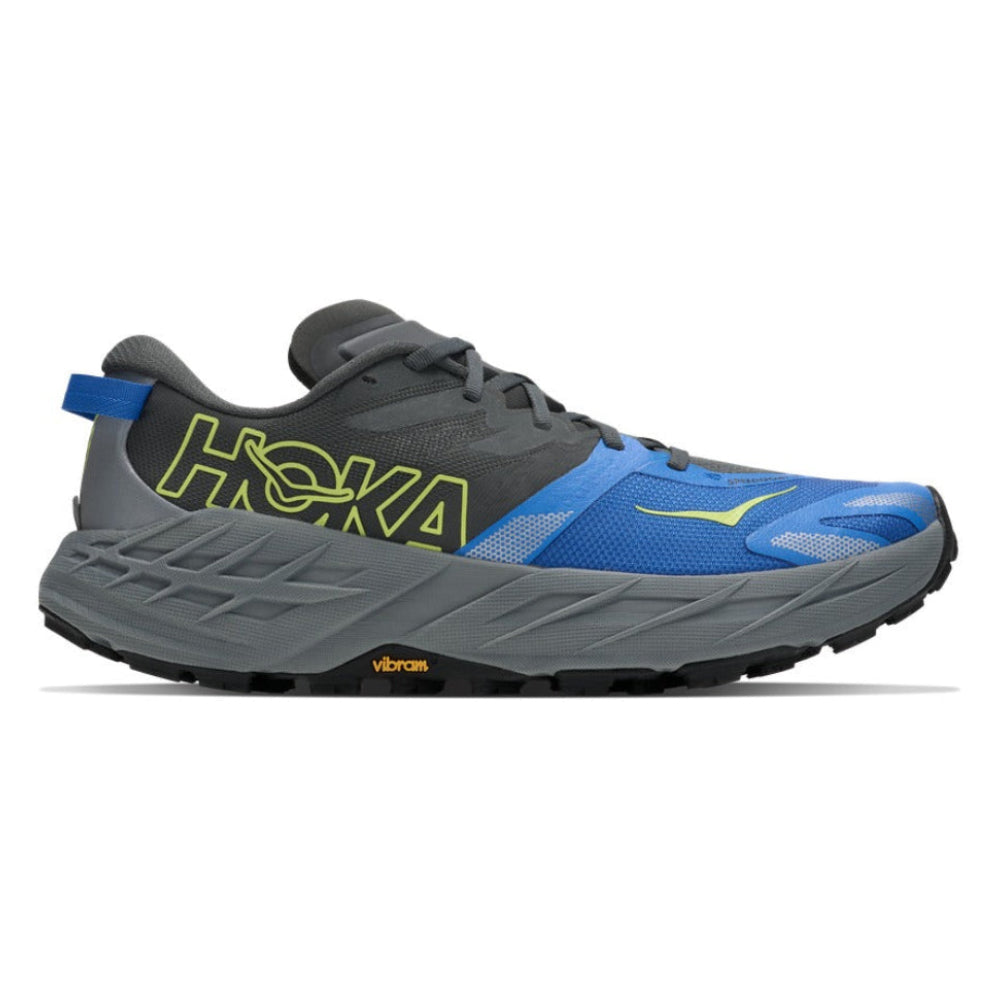 Vista lateral interior de la zapatilla trail Hoka Speedgoat 7 azul y gris con logo Hoka en el talon