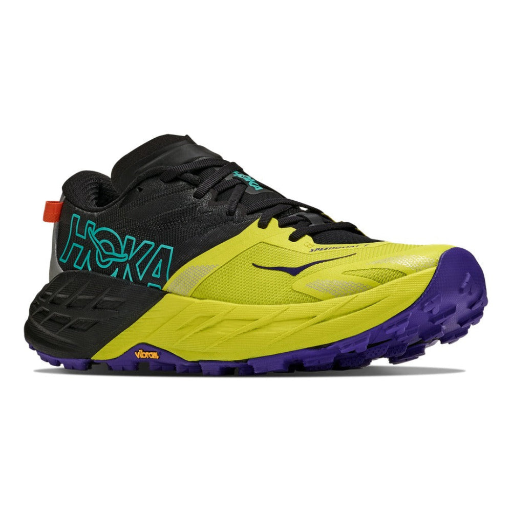 Zapatilla de trail running Hoka One One Speedgoat 7 negro y amarillo, vista lateral exterior