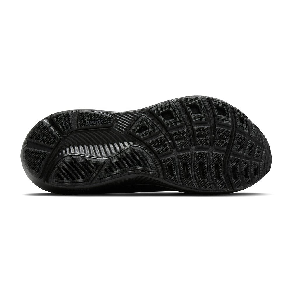 Suela de caucho de la zapatilla Brooks Ghost 18 negra de hombre, vista inferior con el dibujo de los tacos