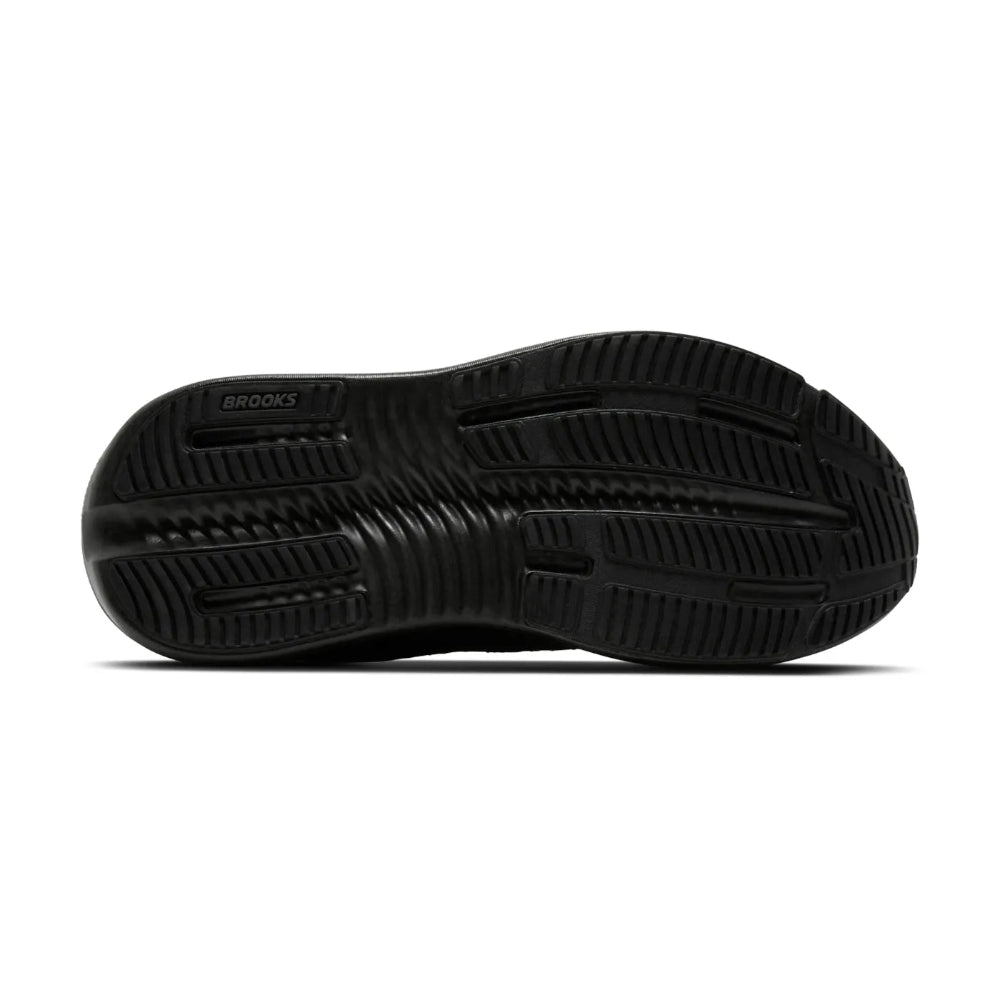 Suela negra de la zapatilla Brooks Ghost Max 4, vista inferior con el dibujo de la banda de rodadura