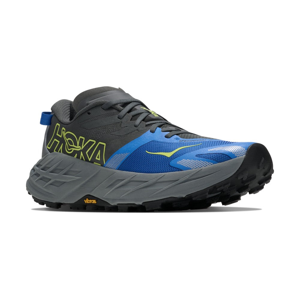 Zapatilla de trail running Hoka One One Speedgoat 7 azul y gris, vista lateral exterior