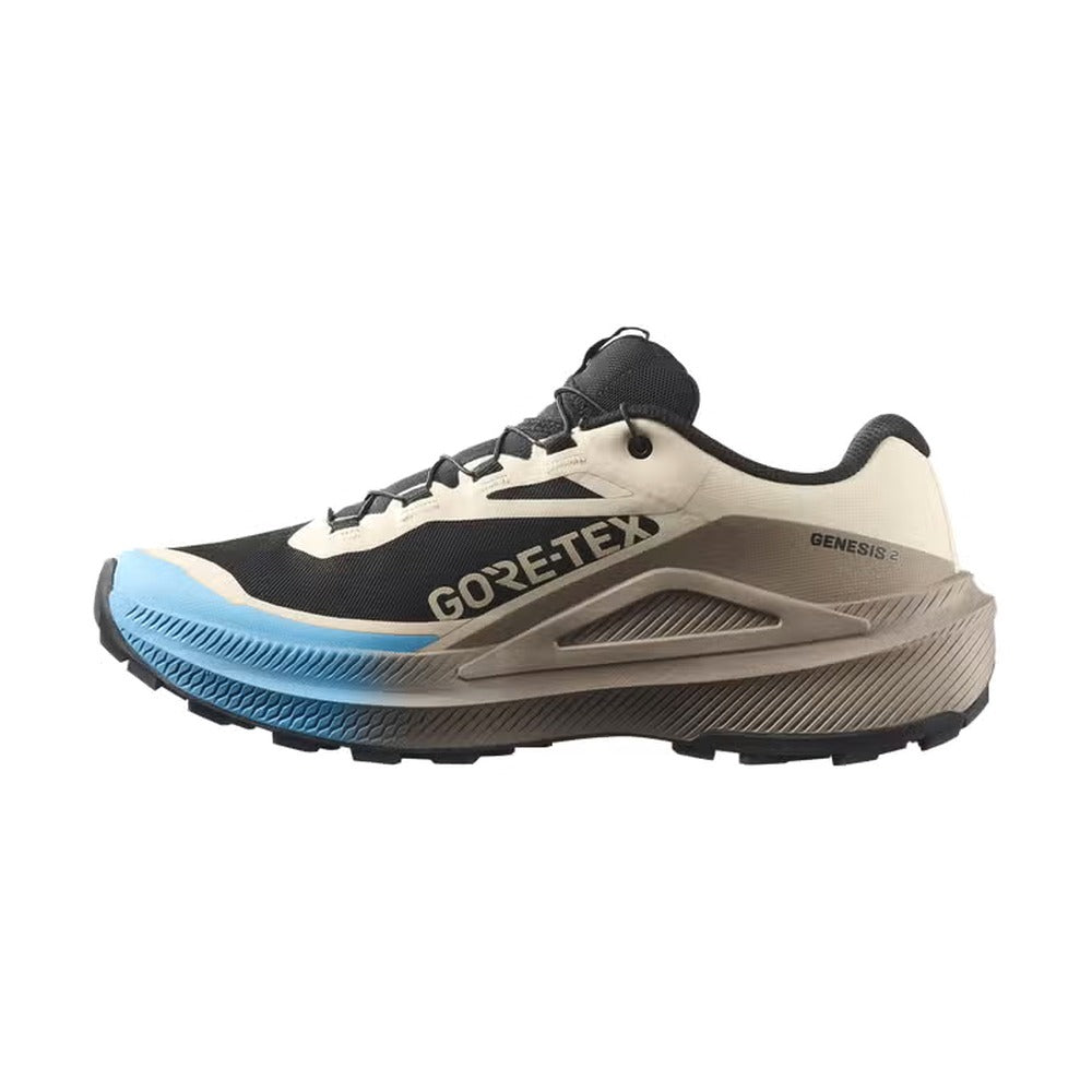 Lateral interior de la zapatilla Salomon Genesis 2 GTX beige, negro y azul con logo Salomon y membrana GORE-TEX