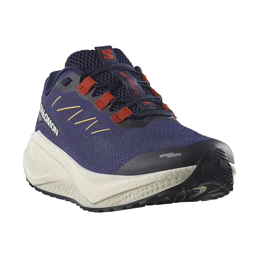 Zapatilla Salomon Aero Glide 3 GRVL azul marino y crema en vista tres cuartos, detalle de la puntera, los cordones y la mediasuela